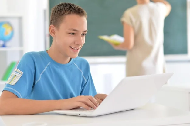 Jovem aprendendo informática na sala de aula